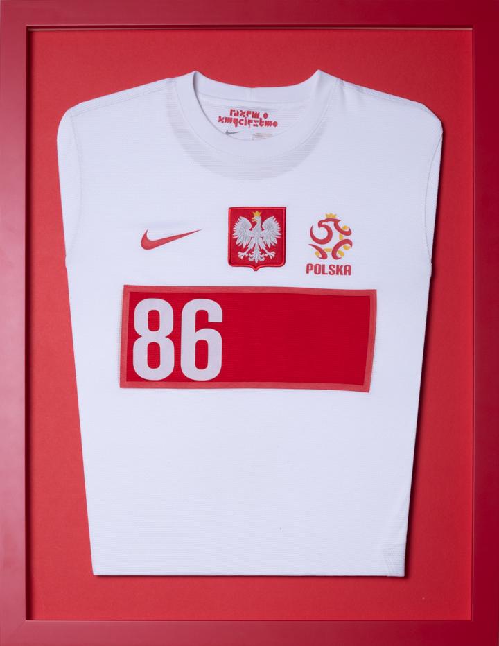 football shirt in a red frame